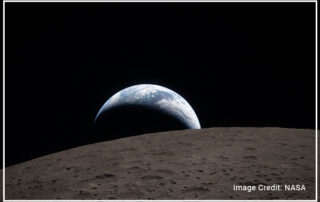 Earthset captured through the Orion spacecraft window on April 6, 2026, during the Artemis II crew’s flyby of the moon