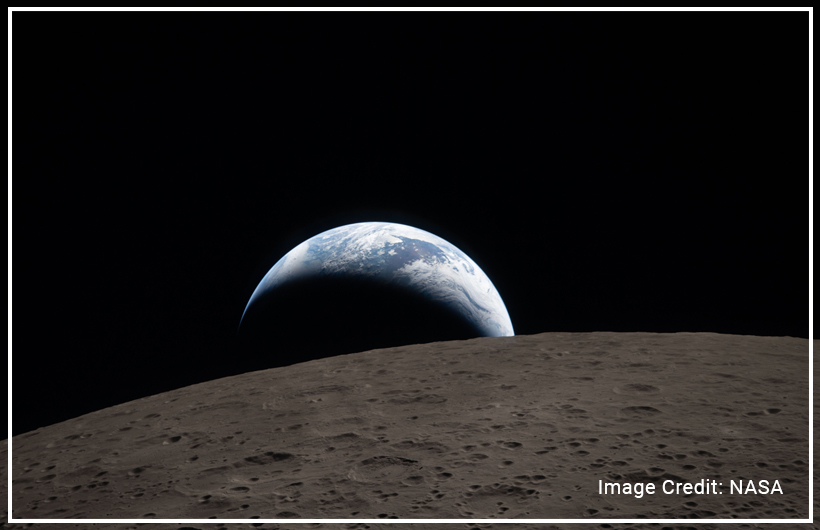 Earthset captured through the Orion spacecraft window on April 6, 2026, during the Artemis II crew’s flyby of the moon